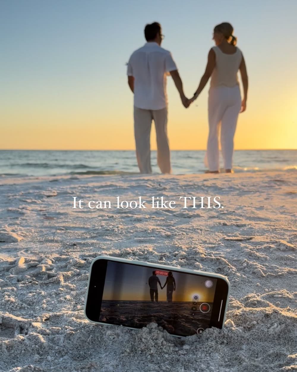 Alla and John of AJ Dream Travel at sunset on the beach, a phone in the sand filming them, from their Instagram feed