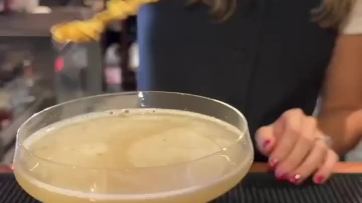 A cocktail being finished at the bar at Sage SRQ, from a Siesta Media reel